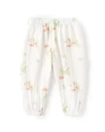 Custom floral print baby joggers, featuring delicate pink flower patterns on a soft cream cotton base, with elasticized waistband and cuffs. Premium infant girl's sweatpants from a professional OEM/ODM clothing manufacturer.