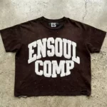 Custom dark brown boys oversized T-shirt with bold white varsity "ENSOUL COMP" print, trendy heavyweight boxy tee, professional OEM/ODM kids streetwear manufacturer in China.
