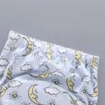 Detail of custom baby training pants waistband, featuring soft high-elasticity rubber band, cute moon and cloud eco-friendly print, premium skin-friendly infant innerwear from a professional OEM/ODM manufacturer.