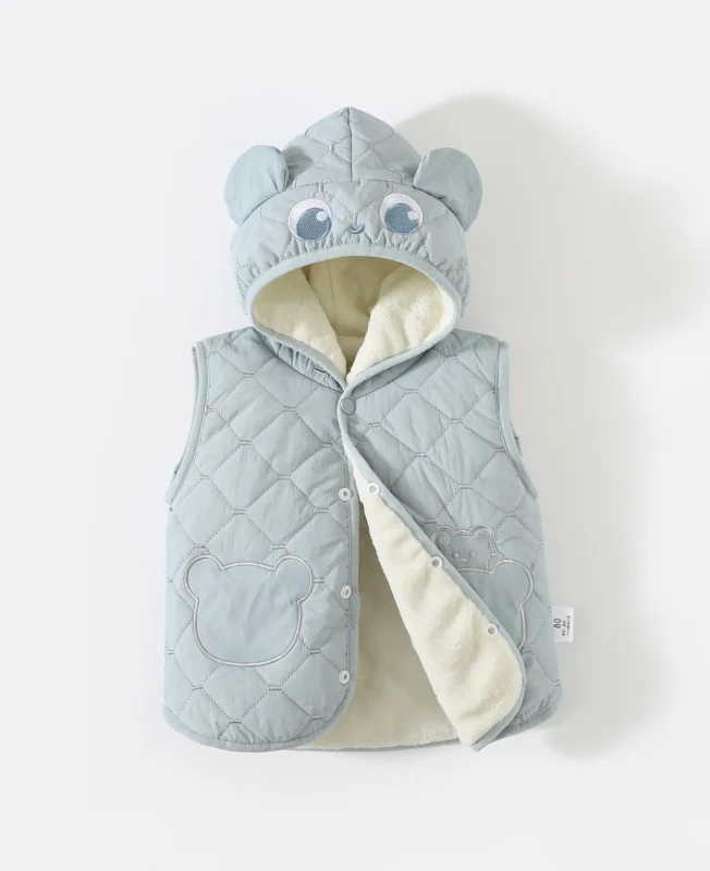 Custom grey quilted baby vest with soft sherpa lining, featuring an adorable bear-ear hood with embroidered eyes, warm winter infant gilet from a professional OEM/ODM clothing manufacturer in China.