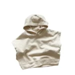 Custom beige baby hooded sweatshirt vest, featuring soft cotton French Terry fabric, elegant minimalist sleeveless hoodie, premium toddler gilet from a professional OEM/ODM clothing manufacturer in China.