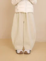 Custom cream white boys' corduroy pants, comfortable wide leg baggy trousers for kids, premium ribbed fabric children's wear from a professional OEM/ODM manufacturer in China.