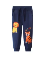 Custom navy blue boys' pants with cartoon lion and tiger prints, comfortable elastic waist kids' joggers, professional OEM/ODM boys' clothing manufacturer in China.
