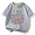 Custom heather grey girls' T-shirt with colorful "Big Sister 2026" graphic print, oversized cotton tee, professional OEM/ODM children's apparel manufacturer in China.