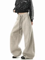 Custom grey wide leg sweatpants with drawstring, oversized baggy joggers for women, high-quality fleece trousers from an OEM/ODM garment manufacturer.