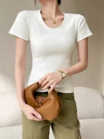 Custom white womens slim fit T-shirt, elegant U-neck short sleeve tee, high-quality stretchy cotton basics from a professional OEM/ODM ladies' clothing manufacturer in China.