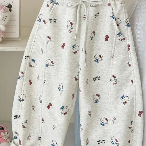 Custom white girls' pants with all-over pattern print, comfortable toddler loose fit trousers, professional OEM/ODM kids' clothing manufacturer.