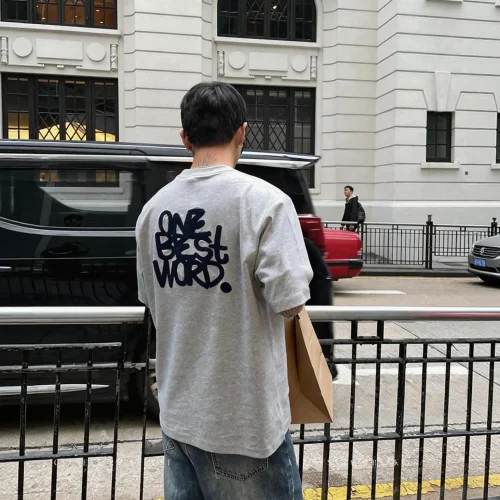 Custom grey mens T-shirt with large back embroidery, high-density lettering embroidered streetwear tee, premium heavyweight cotton apparel from a professional OEM/ODM garment manufacturer.