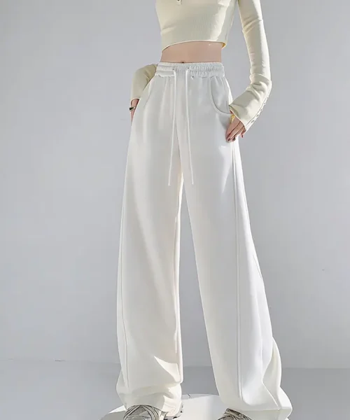 Custom high waisted white wide leg pants for women, stylish loose fit trousers for OEM and ODM clothing manufacturing.